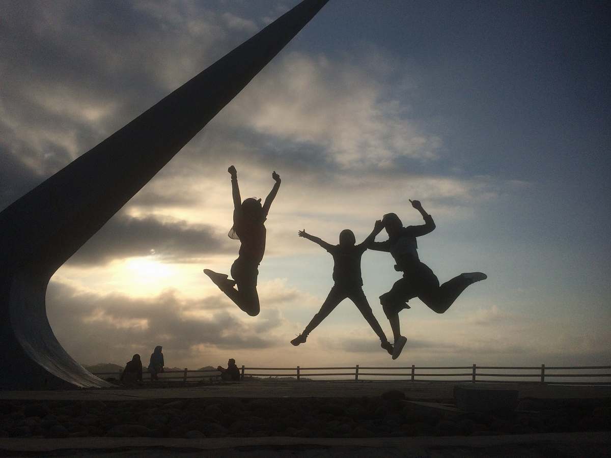 leisure activities three jumping people dance pose